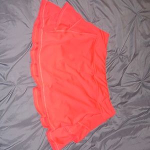Layer 8 bright orange tennis skirt.  Worn twice.